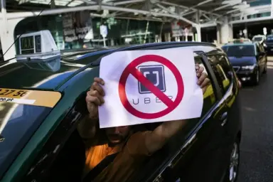 Китай легализует приложения для вызова автомобиля Didi и Uber